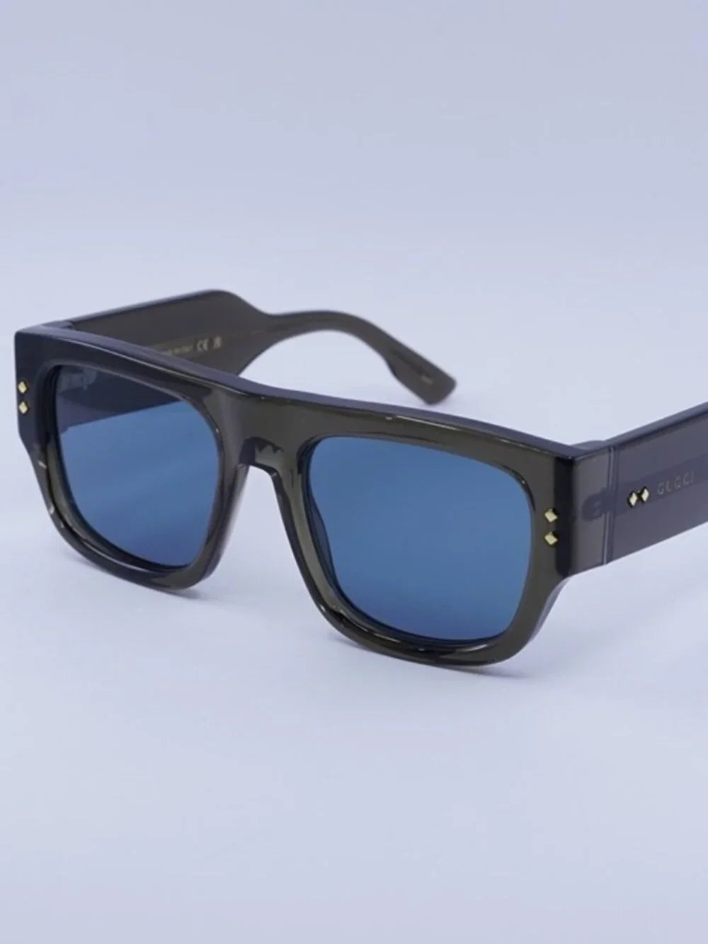 Gucci GG1262S 003 Sunglasses Transparent Dark Grey Square Frame, Blue Lenses